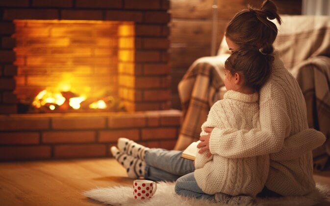 Mother Child In Front Of Fireplace (1)